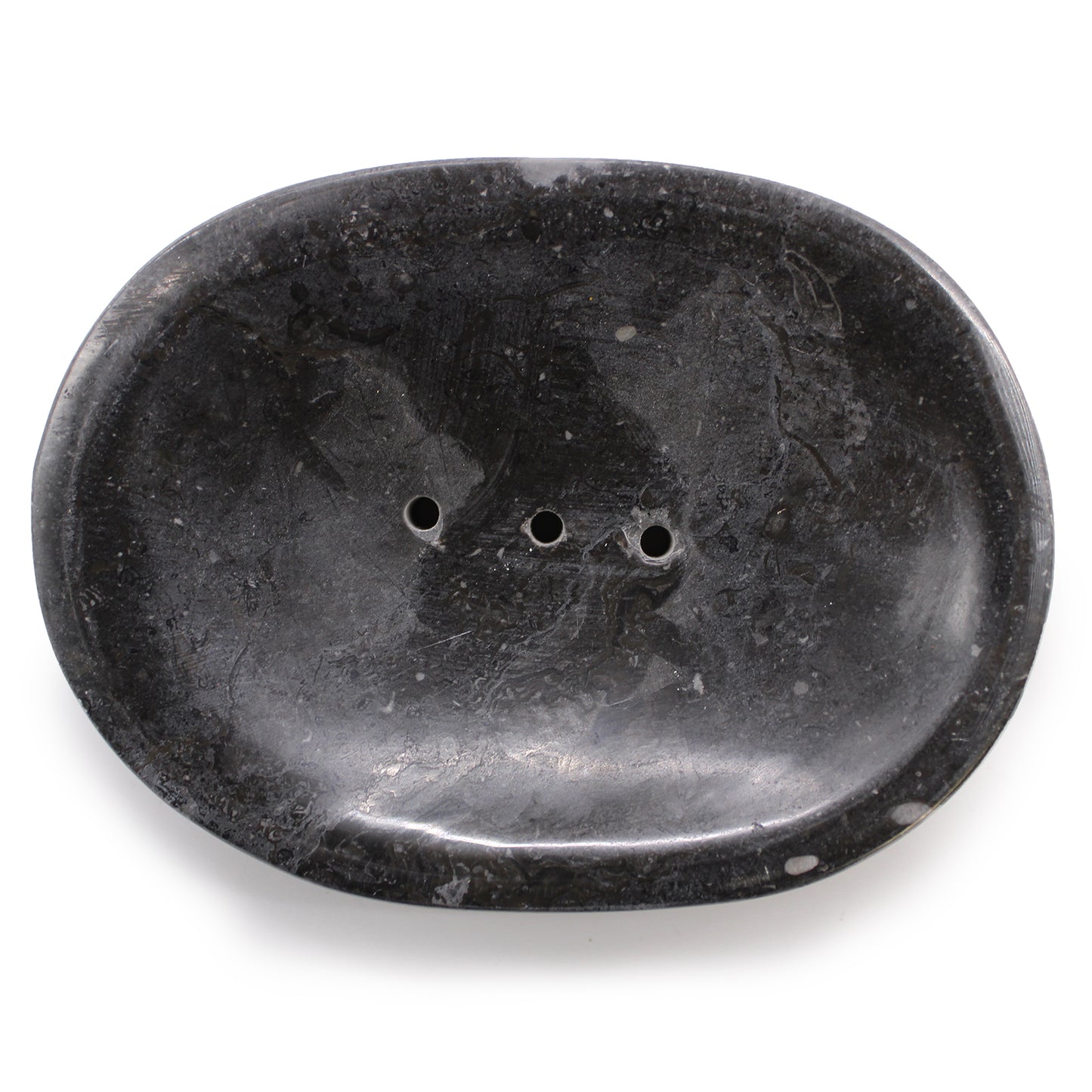 Black oval marble soap dish with 3 drainage holes. View of the top.