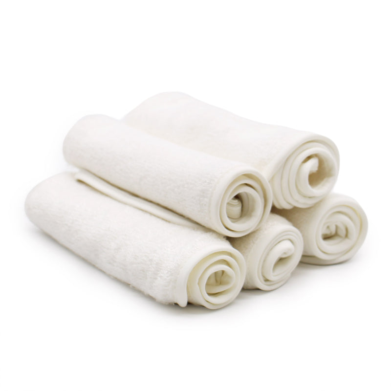 Bamboo Face Cloth in cream rolled up.