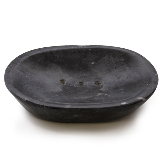 Black oval marble soap dish with 3 drainage holes.  View of the top and side. 