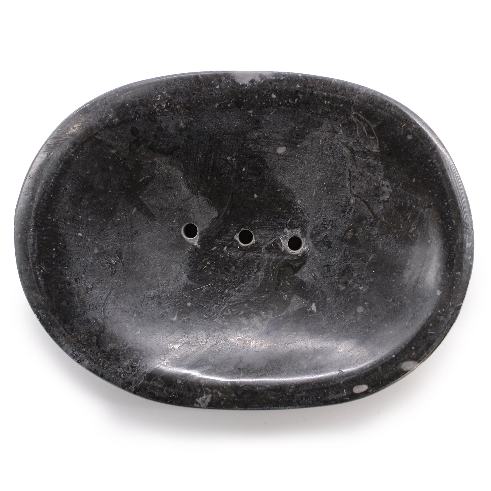 Black oval marble soap dish with 3 drainage holes.  View of the top. 