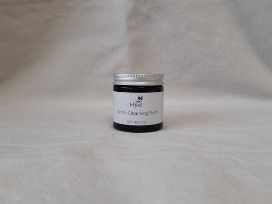 Jar of Hyd Gentle Cleansing Balm on a grey background